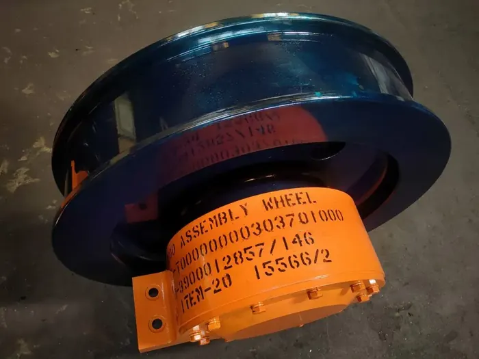 Painted crane wheel assembly for a cement plant
