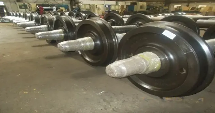Row of wheel axle assemblies for a steel plant transfer car