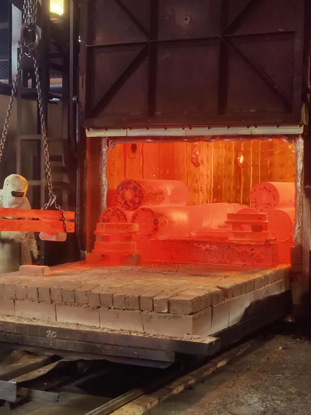 Glowing forgings in a heat-treatment furnace at Vikrant Forge
